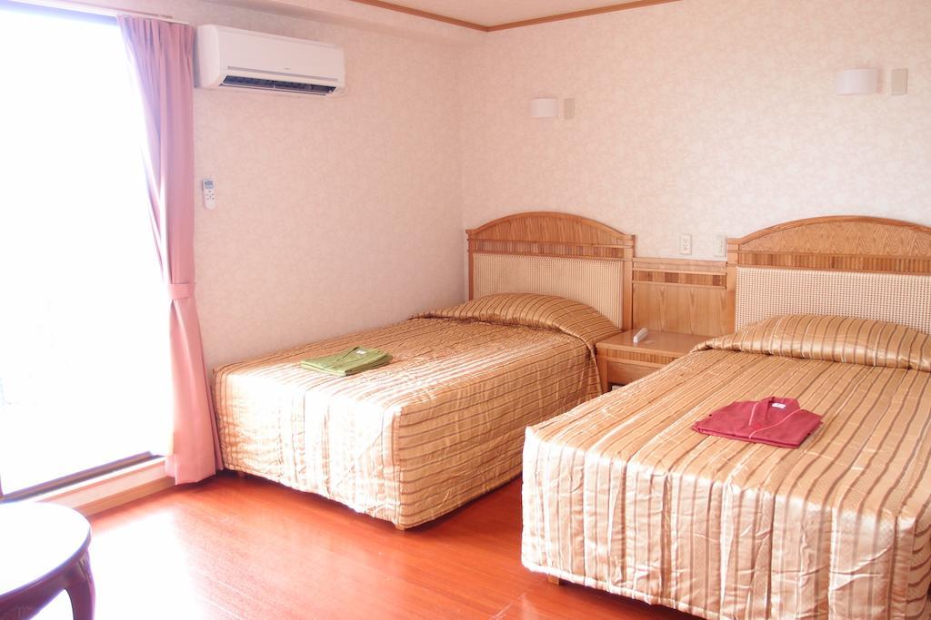 Hotel Castlevillage Miyakojima Quarto foto