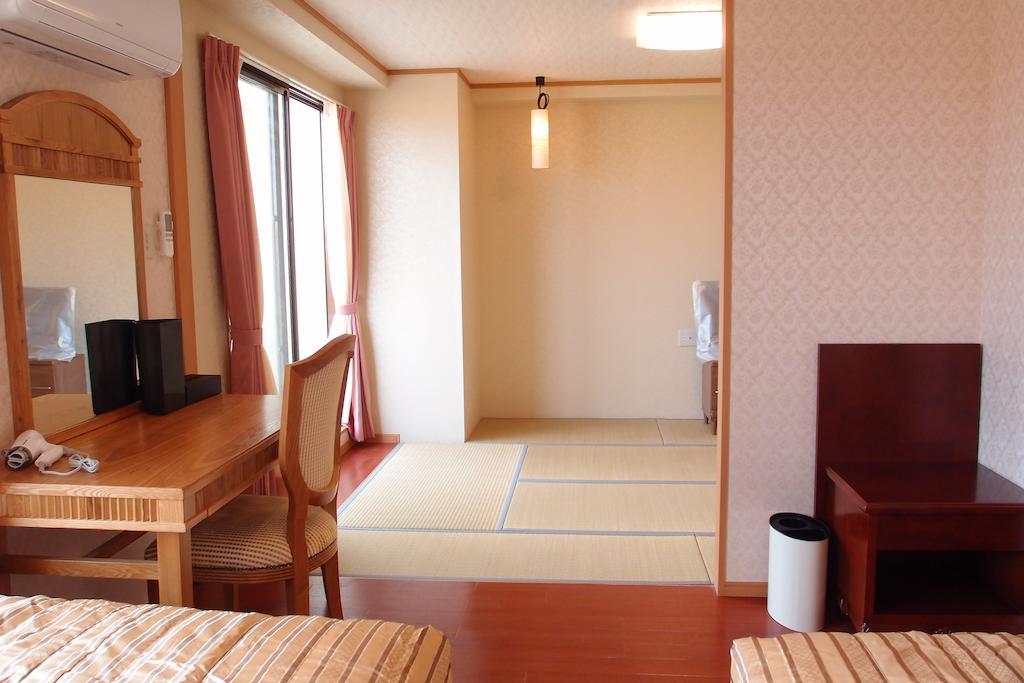 Hotel Castlevillage Miyakojima Quarto foto